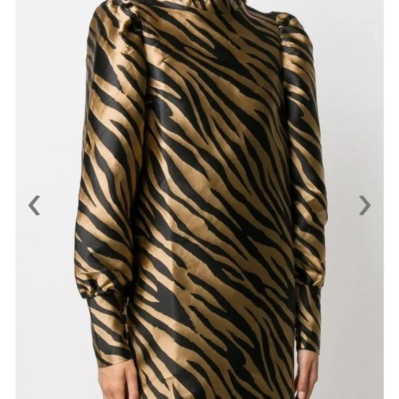 NWT mini dress 
This is the cutest dress. Very nice material. Sold out online. - Picture 2 of 10